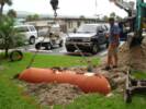 Large 500 Gallon Tank being lowered into ground